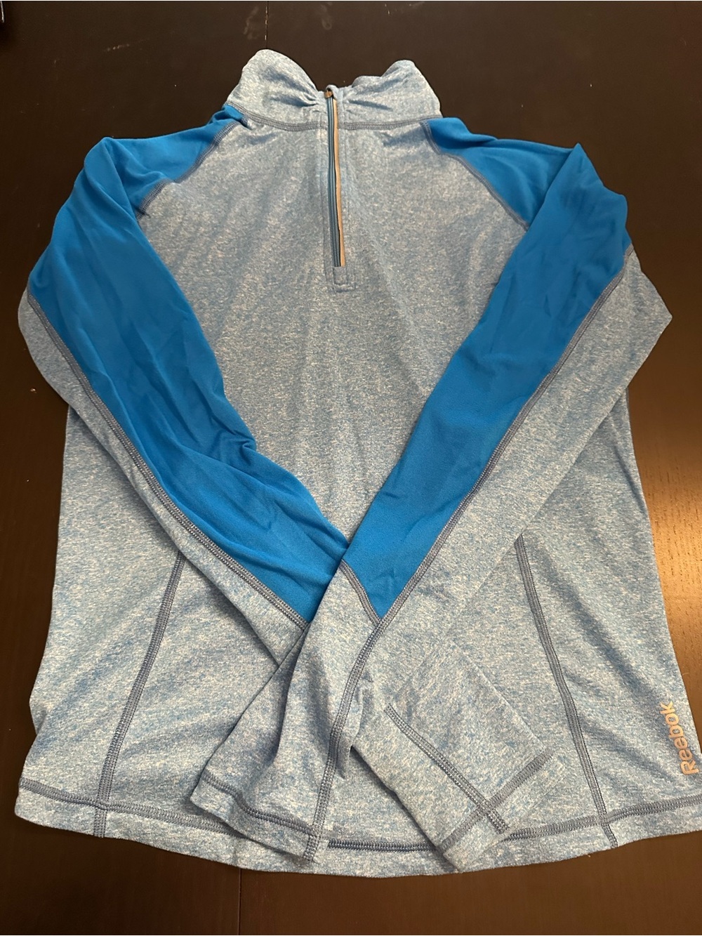 Reebok Light Blue Half-Zip Jacket with Bright Blue Sleeve Panels